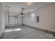 Attached garage with automatic opener and concrete floor at 100 Howell St # 13A, Hickory, NC 28601