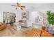 Cozy living room with hardwood floors, modern decor, and bright natural light at 10105 Bon Meade Ln, Cornelius, NC 28031