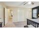 Bedroom featuring carpeted floors, white closet doors, and a view into the hallway at 1025 Twin Lakes Rd, Rock Hill, SC 29732