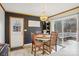 Cozy dining room with a chandelier and a sliding door with access to the backyard at 1025 Twin Lakes Rd, Rock Hill, SC 29732