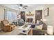 Inviting living room with cozy furniture, a fireplace, and a ceiling fan at 1025 Twin Lakes Rd, Rock Hill, SC 29732