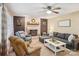 Inviting living room with cozy furniture, a fireplace, and a ceiling fan at 1025 Twin Lakes Rd, Rock Hill, SC 29732