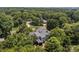 An aerial view of the home, with lush green landscaping surrounding the residence and neighborhood at 110 Lynbrook Dr, Davidson, NC 28036