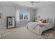 Bright bedroom with a large window, carpet flooring and neutral colored walls at 110 Lynbrook Dr, Davidson, NC 28036