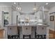 Stylish kitchen island with pendant lighting and seating at 110 Lynbrook Dr, Davidson, NC 28036