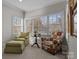 Cozy sitting area with large windows providing natural light at 110 Lynbrook Dr, Davidson, NC 28036