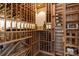 Climate controlled wine cellar with custom wooden racks for ample bottle storage at 110 Lynbrook Dr, Davidson, NC 28036