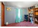 Bedroom with carpet flooring, bookshelf and window at 111 Green Dr, Richburg, SC 29729