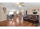 Open concept dining area with hardwood floors and a view of the kitchen at 111 Green Dr, Richburg, SC 29729