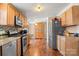 Spacious kitchen with wood cabinets, granite counters, and stainless steel appliances at 111 Green Dr, Richburg, SC 29729