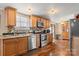 Kitchen with stainless steel appliances and wood cabinets at 111 Green Dr, Richburg, SC 29729