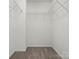 Walk-in closet with wire shelving for storage at 1115 Ross Brook Trce, York, SC 29745