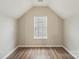 Bedroom featuring a window and neutral walls at 12218 Stewarts Crossing Dr, Charlotte, NC 28215