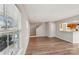 Bright living room featuring hardwood floors and an open floorplan at 12218 Stewarts Crossing Dr, Charlotte, NC 28215