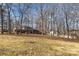 Ranch style home nestled on a wooded lot at 1308 Gum Branch Rd, Charlotte, NC 28214