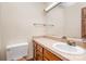 Clean bathroom with single sink vanity and shower at 1308 Gum Branch Rd, Charlotte, NC 28214