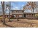 Brick house with a large backyard and mature trees at 1308 Gum Branch Rd, Charlotte, NC 28214