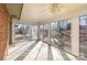 Bright sunroom with sliding glass doors and backyard view at 1308 Gum Branch Rd, Charlotte, NC 28214