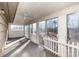 Bright sunroom with sliding glass doors and backyard view at 1308 Gum Branch Rd, Charlotte, NC 28214