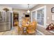 Kitchen features a breakfast nook and view into Gathering room at 1318 Gum Branch Rd, Charlotte, NC 28214