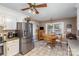 Eat-in kitchen with stainless steel appliances and wood table at 1318 Gum Branch Rd, Charlotte, NC 28214