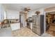 Bright kitchen with stainless steel appliances and white cabinets at 1318 Gum Branch Rd, Charlotte, NC 28214