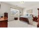 Well-lit bedroom with carpet, neutral paint, and a window with blinds at 132 Picasso Trl, Mount Holly, NC 28120