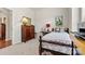 Spare bedroom includes beautiful vintage furnishings and light, neutral walls at 132 Picasso Trl, Mount Holly, NC 28120