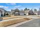 Beautiful exterior view of a well-maintained home with manicured lawn and lovely curb appeal at 132 Picasso Trl, Mount Holly, NC 28120