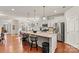 Modern kitchen with stainless steel appliances, granite countertops, and a breakfast bar at 132 Picasso Trl, Mount Holly, NC 28120