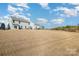 Wide shot of a spacious, grassy backyard perfect for recreation at 1433 Harleston St, Indian Trail, NC 28079