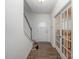 Bright entryway featuring wood-look floors, a staircase, and a glass-paneled door at 1433 Harleston St, Indian Trail, NC 28079