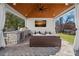 Outdoor kitchen and seating area under covered pavilion at 20517 Queensdale Dr, Cornelius, NC 28031