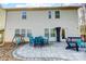 Backyard patio featuring comfortable seating, a barbecue, and mature trees at 2222 Bluebell Way, Fort Mill, SC 29708