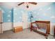 This bedroom has a toy story theme with cloud wallpaper at 2222 Bluebell Way, Fort Mill, SC 29708