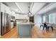 Spacious kitchen boasting an island with granite countertops, stainless appliances, and ample cabinet space at 2222 Bluebell Way, Fort Mill, SC 29708