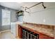 Functional laundry room featuring a convenient folding counter, storage rack, washer, and dryer at 2222 Bluebell Way, Fort Mill, SC 29708