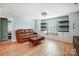 Comfortable living room features built-in shelves and cabinets at 2222 Bluebell Way, Fort Mill, SC 29708