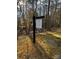 Wooded lot for sale, featuring a For Sale sign at 295 Tradition Dr, Mount Gilead, NC 27306