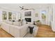Bright living room featuring a fireplace and large windows with natural light at 3132 Carol Ave, Charlotte, NC 28208