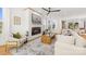 Living room featuring a modern fireplace and large windows with natural light at 3132 Carol Ave, Charlotte, NC 28208