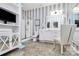 Bathroom featuring a glass-enclosed shower, sleek vanity, toilet, and storage cabinet with a TV at 3134 Sterling Ct, Fort Mill, SC 29707