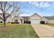 Charming one-story home with a well-manicured lawn and attached two-car garage at 3134 Sterling Ct, Fort Mill, SC 29707