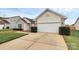 One-story home with a well-manicured lawn and attached two-car garage at 3134 Sterling Ct, Fort Mill, SC 29707