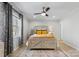 Serene bedroom with a farmhouse-style bed, ceiling fan, and soft lighting, creating a relaxing retreat at 503 Brookfield Cir # 1, Salisbury, NC 28146