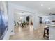 Open dining room with wood floors, a round table, and natural lighting at 503 Brookfield Cir # 1, Salisbury, NC 28146