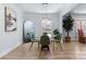 Bright dining area with glass table, pendant lighting, and ample natural light creating a warm and inviting atmosphere at 503 Brookfield Cir # 1, Salisbury, NC 28146