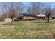 Charming brick home with a well-manicured lawn and solar panels on the roof at 503 Brookfield Cir # 1, Salisbury, NC 28146