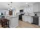 A kitchen featuring stainless steel appliances, granite countertops, a center island with seating, and sleek cabinetry at 503 Brookfield Cir # 1, Salisbury, NC 28146