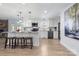 Bright kitchen featuring stainless steel appliances, granite countertops, a center island, and sleek, white cabinetry at 503 Brookfield Cir # 1, Salisbury, NC 28146